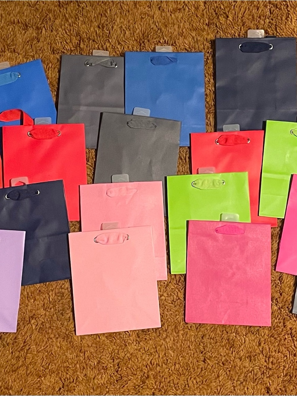 Assorted Hallmark Small Colored Party Gift Bags โ Multi-Pack